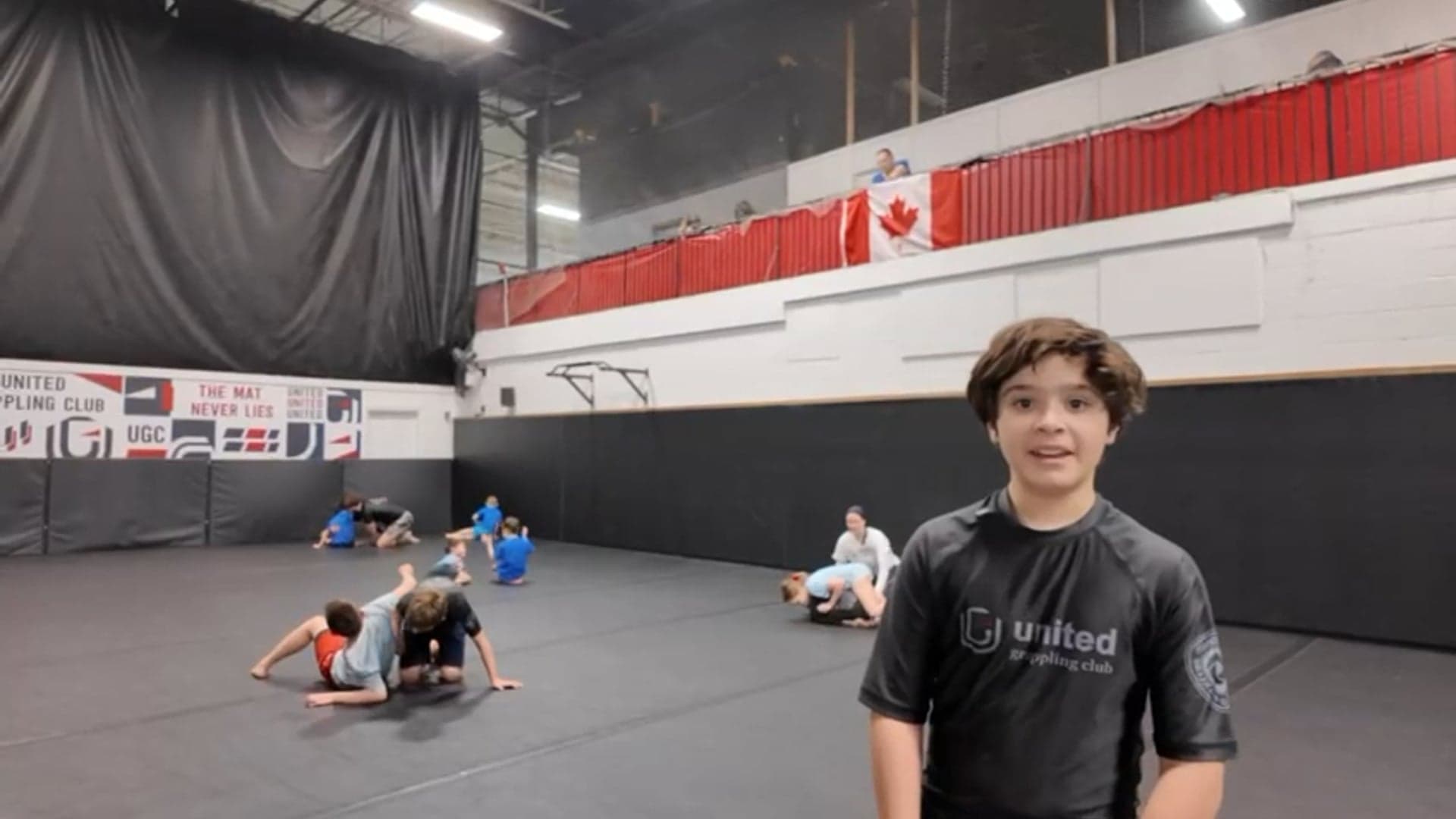 Kids practising age-appropriate partner control at United Grappling Club