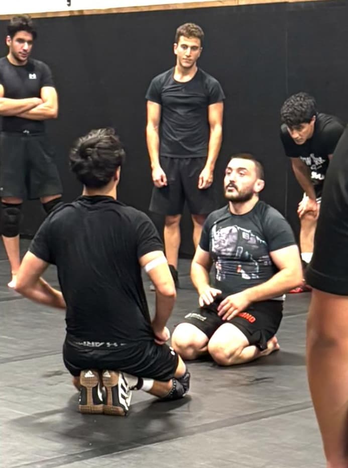 Wrestler with headgear at United Grappling Club
