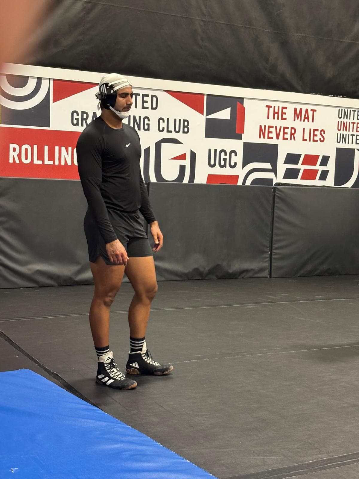 Wrestling coach instruction at United Grappling Club
